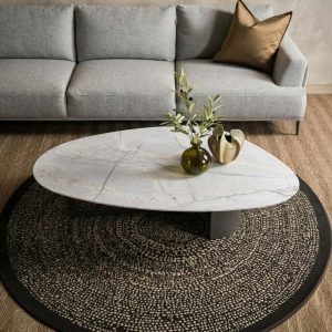 Soft-Edge Marble-Look Coffee Table with Grey Steel Base – styled in a living room